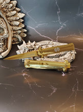 Load image into Gallery viewer, Cute Gold pocket knife with money sign
